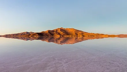 Mountains surrounding the Uyuni salt flat during sunrise. PH Diego Delso Salar_de_Uyuni_Bolivia_2016-02-04_DD_10-12_HDR-1